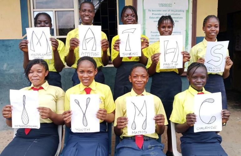 A local IYMC Student Group from Nigeria taking a gorup for for the International Youth Math Challenge